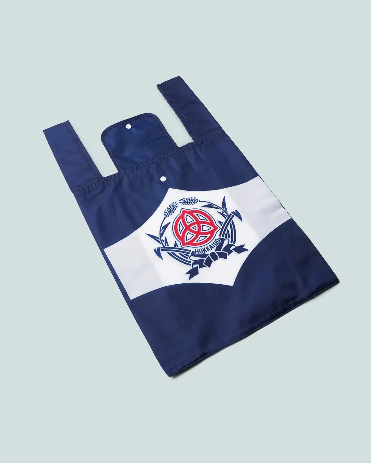 ナイロンリップストップレジ型エコバッグ_フラップ折りたたみ_斜め平置き